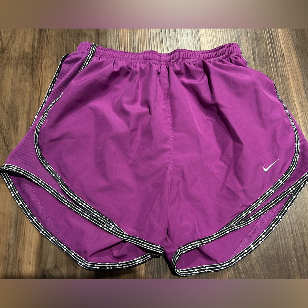 Purple Nike running shorts
